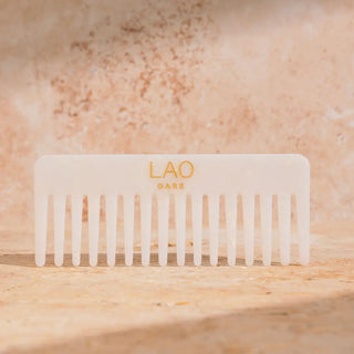 Peigne Démêlant LAO Care à dents larges en acétate translucide, logo doré